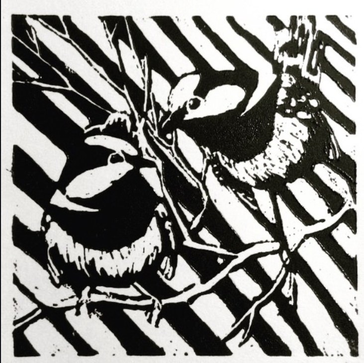 Black and white print of birds in branches by Aleshanee Karan